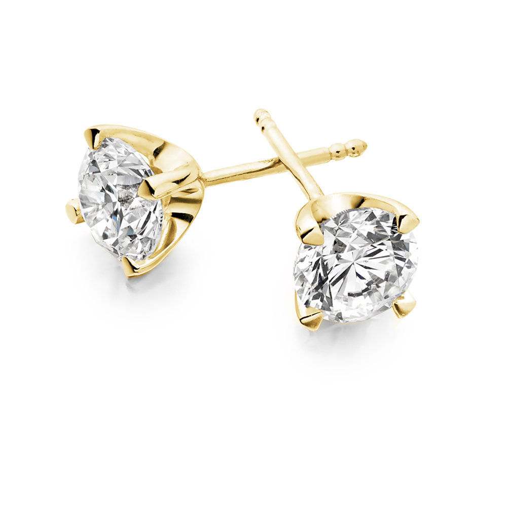 Orecchini punto luce in oro giallo 18 kt modello griffe classica ct. 0.50